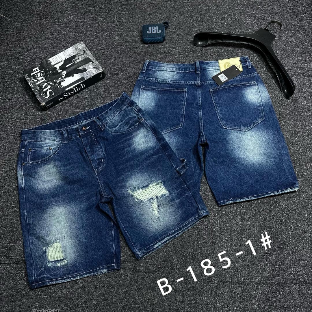 Blue distressed denim shorts showing front rips and back view with hanger.