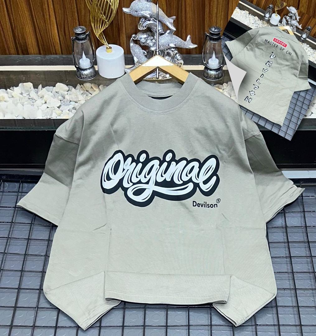 Beige oversized polo shirt showing Original Devilson print and back design.