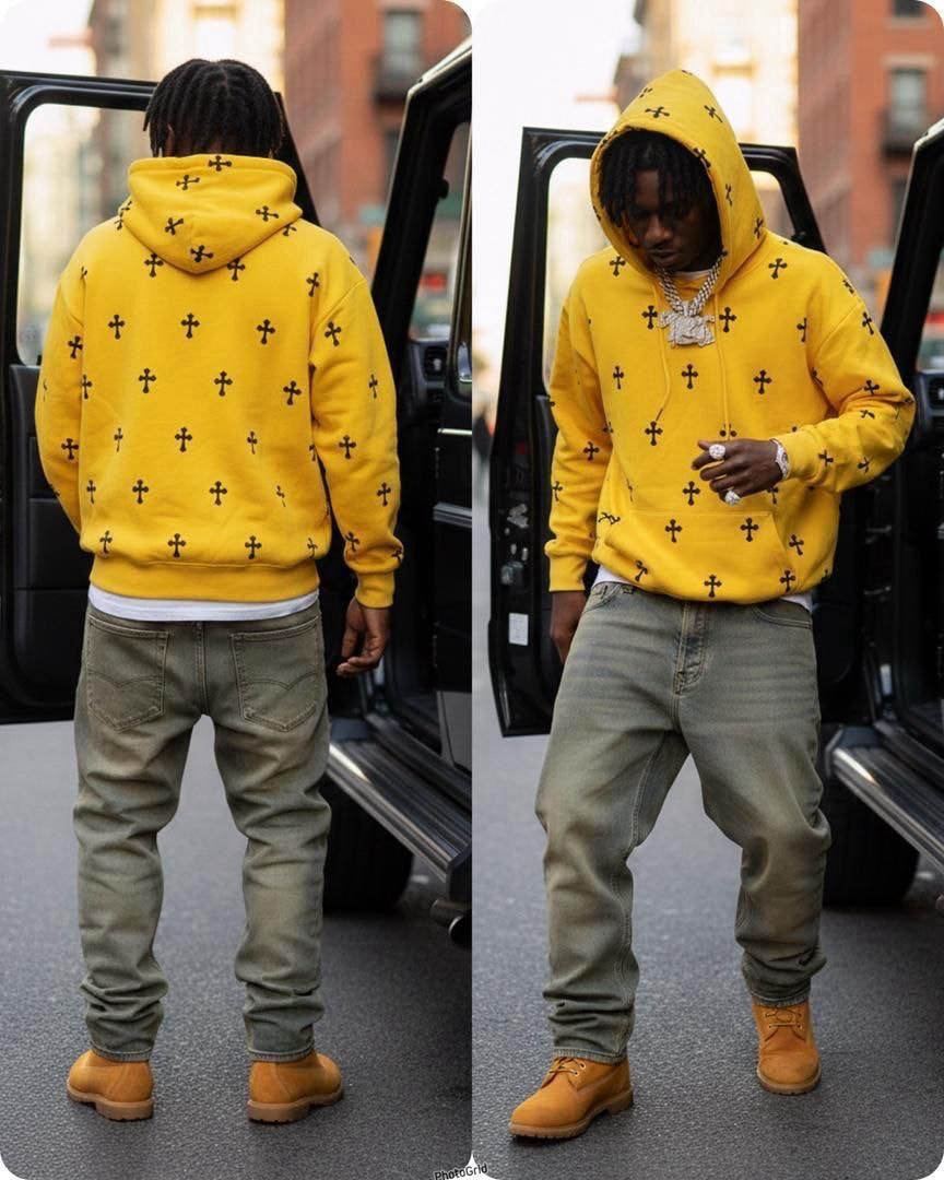 Yellow all-over cross print hoodie modeled from back and front angles.