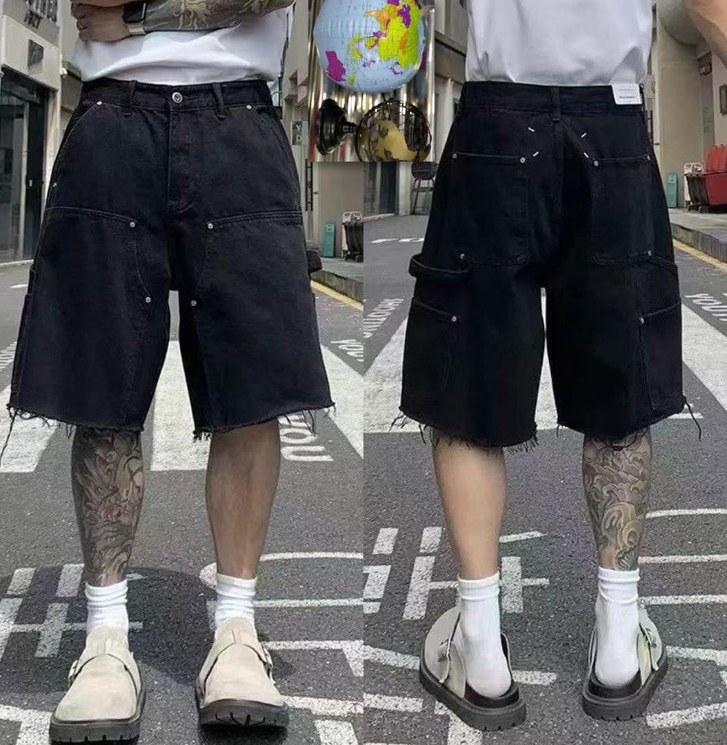 Man with leg tattoos wearing black frayed denim cargo shorts, front and back views.