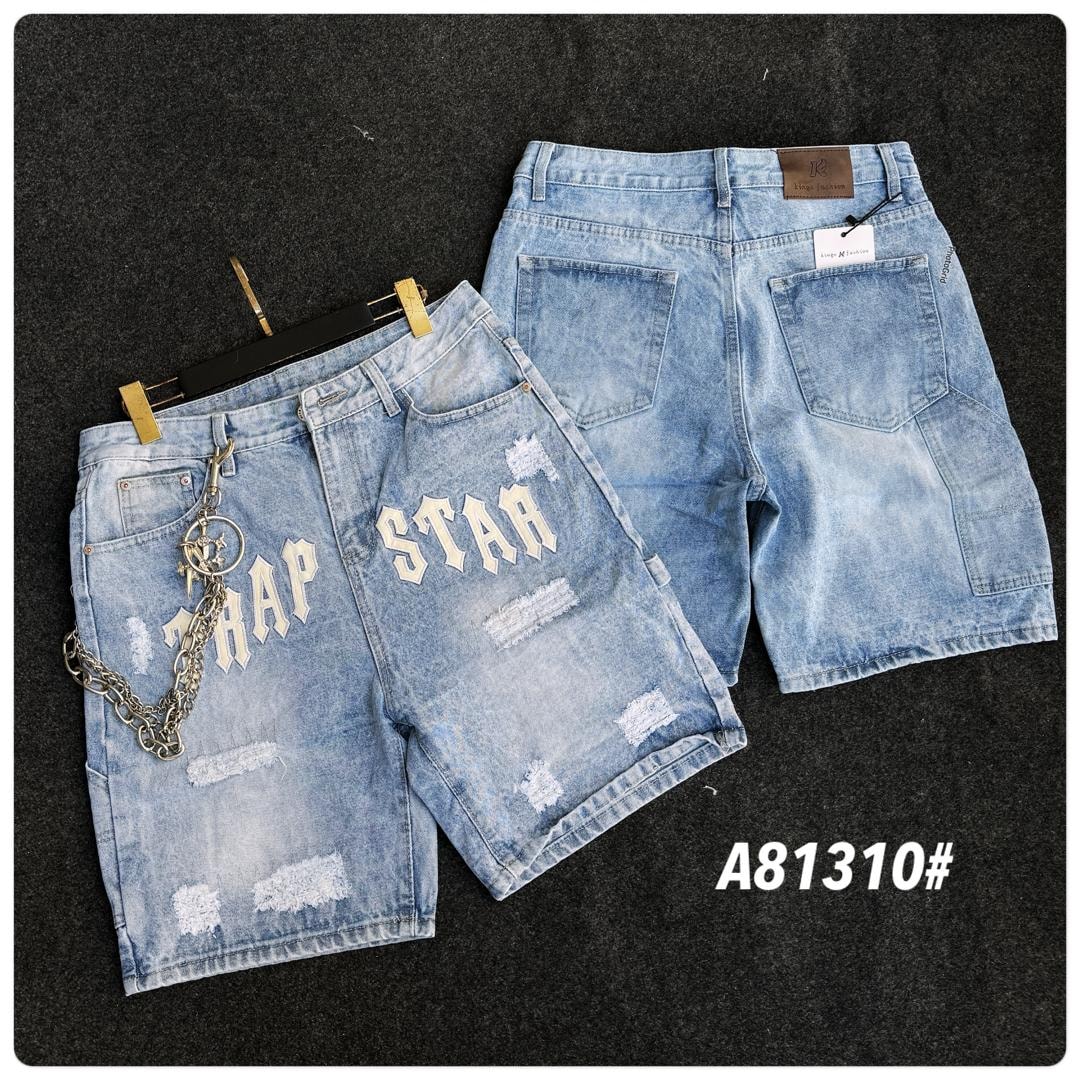 Front and back display of light wash Trap Star graphic denim shorts with patches and chain.