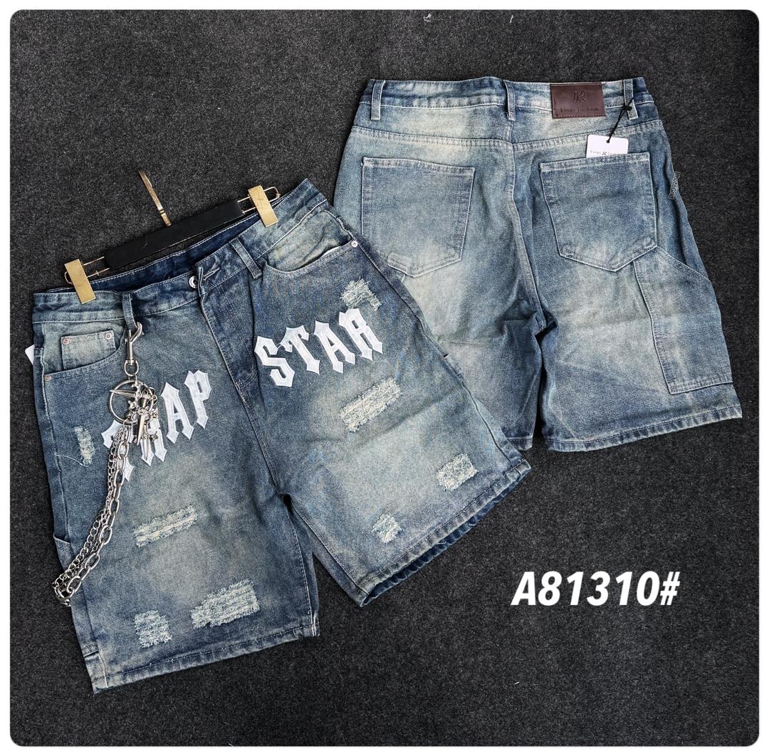 Light blue denim shorts with TRAP STAR text, distressing, chain accessory, and back cargo pocket view.