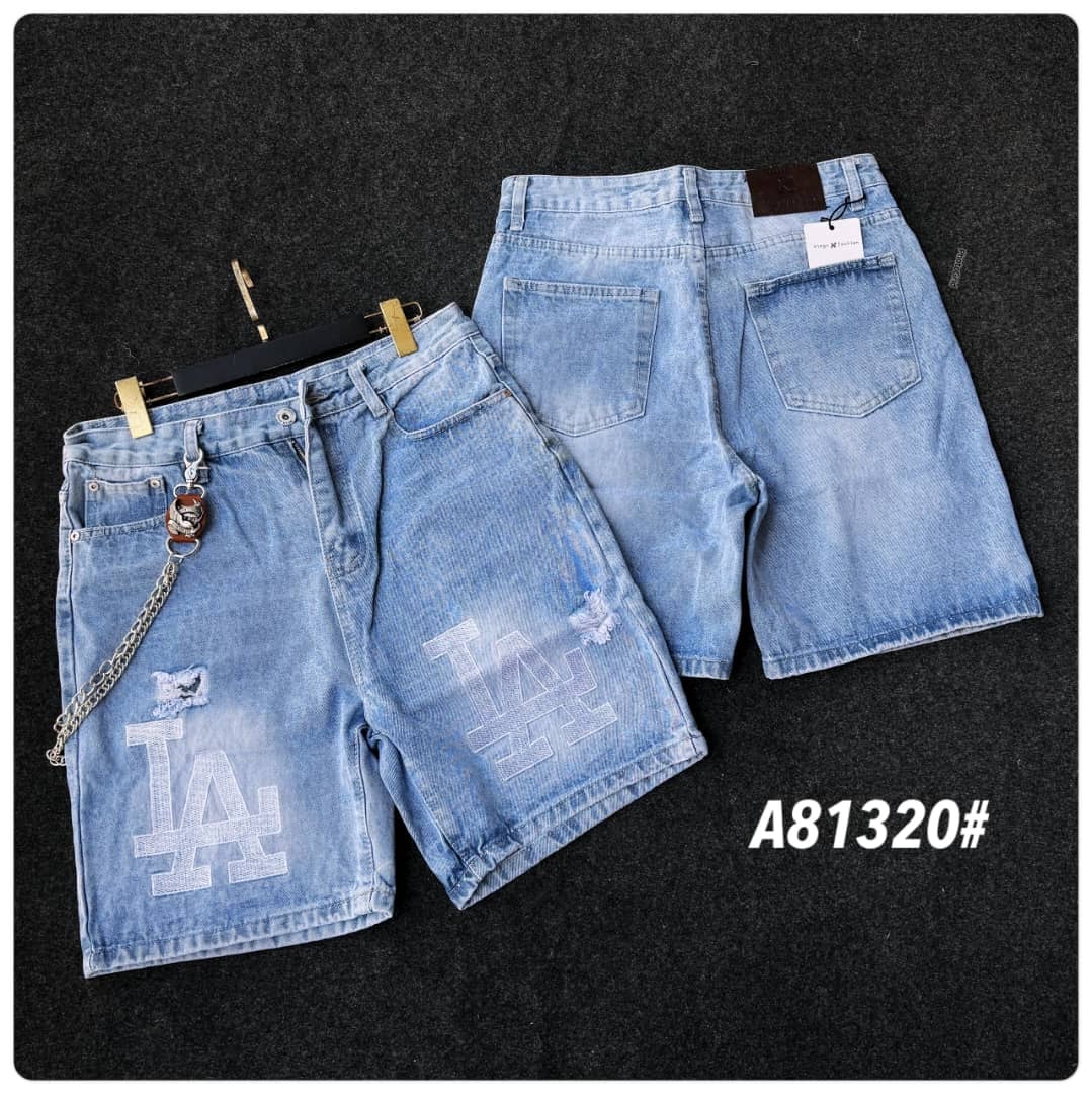 Light blue denim shorts with large LA logo on front, small rips, chain detail, and back view.