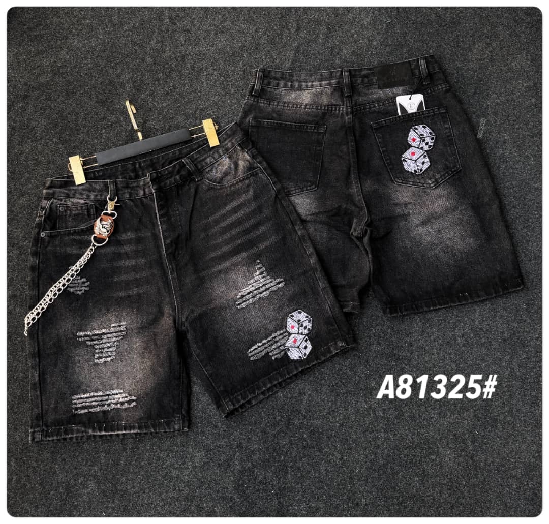 Black denim shorts with dice patches, rips on front leg, and back pocket detail with hanger and flat views.
