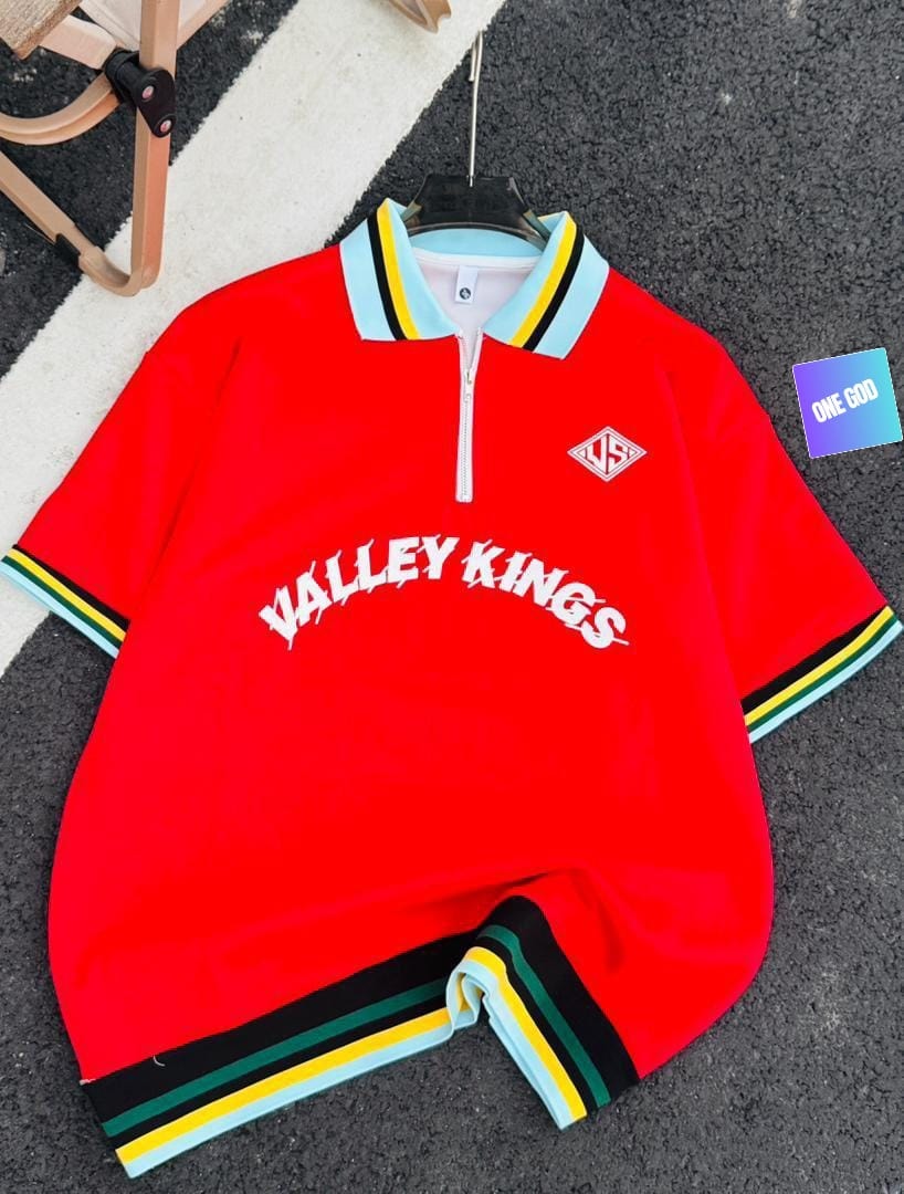 Red Valley Kings quarter-zip polo shirt on dark surface.