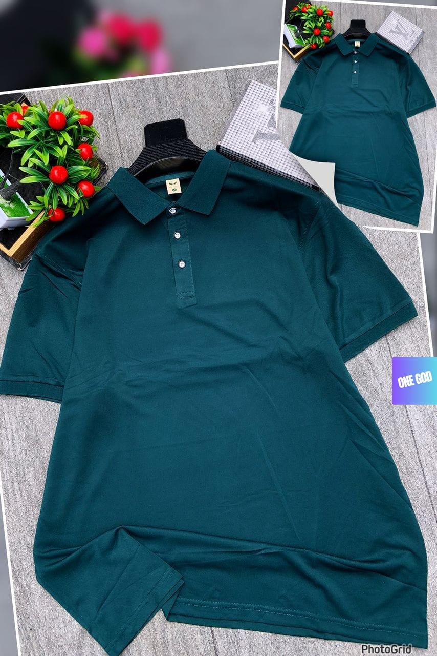 Dark green solid polo shirt on hanger with plant decor and inset image of back view.