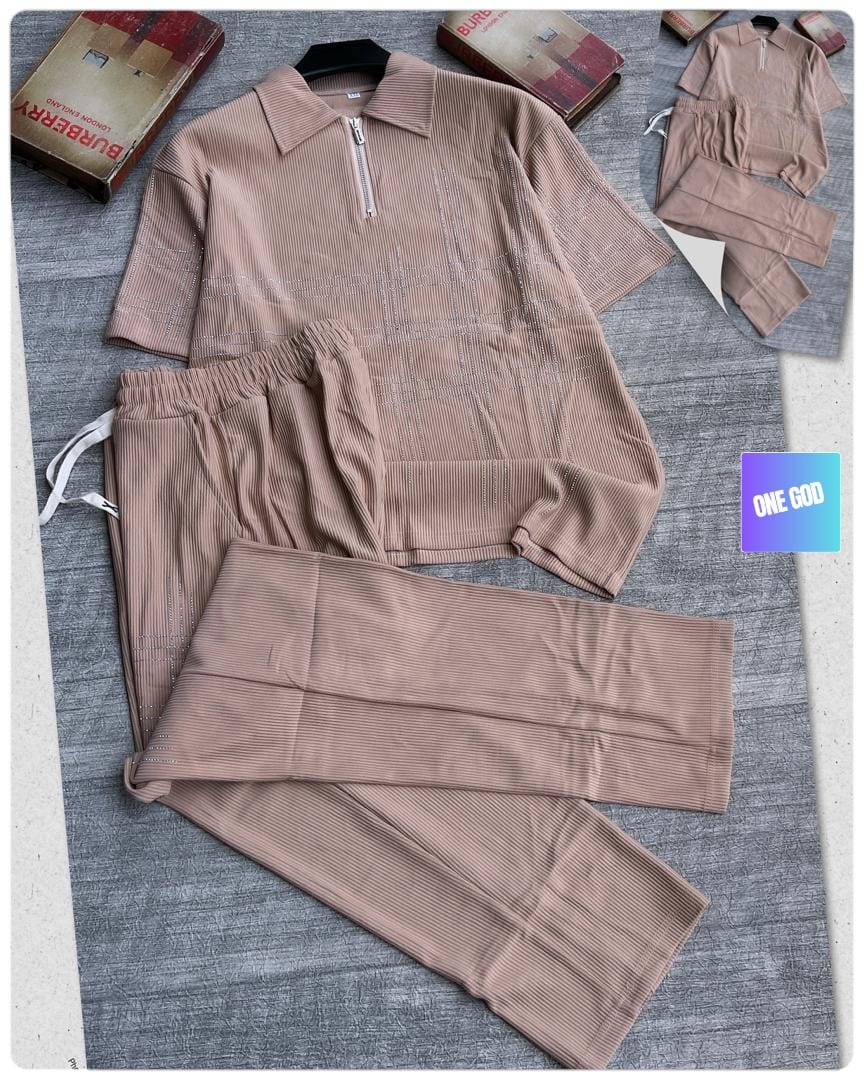 Beige ribbed two-piece set with white rhinestone plaid pattern on polo top and pants.