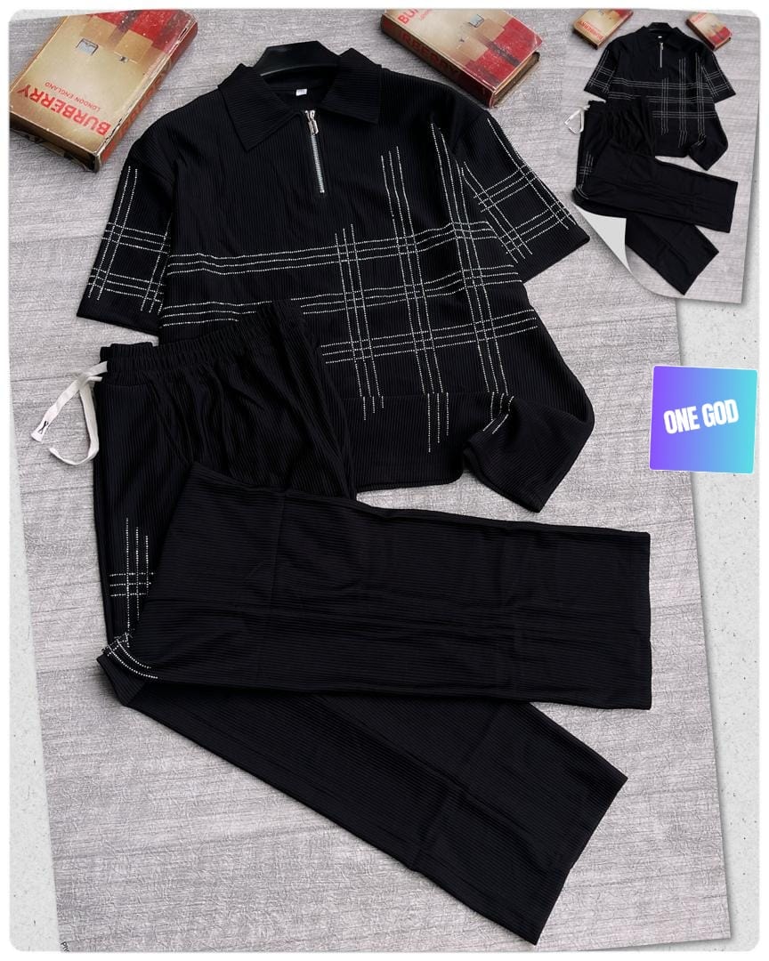 Black ribbed two-piece set with white rhinestone plaid pattern on polo top and pants.