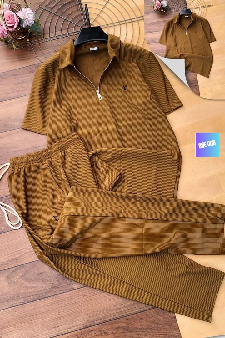 Mustard ribbed two-piece set with LV embroidery on polo top and pants.