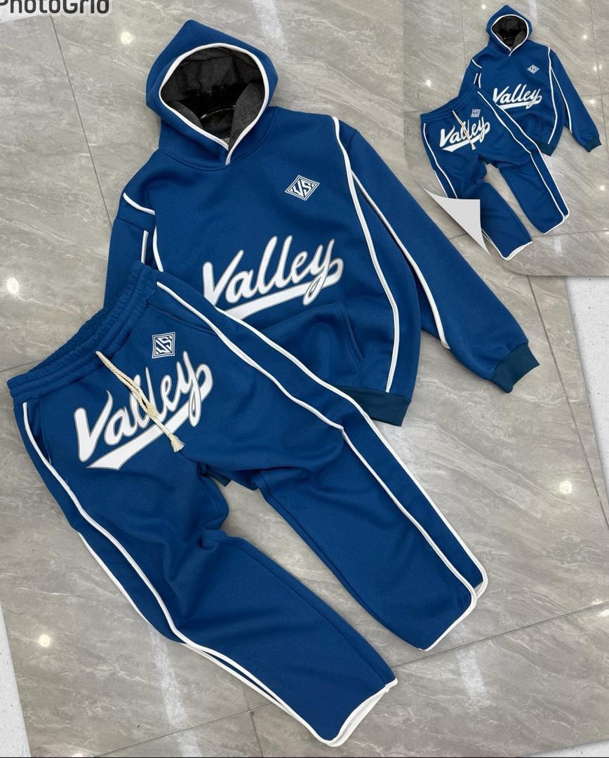 Blue Valley hooded tracksuit and joggers with white contrast piping and logos.