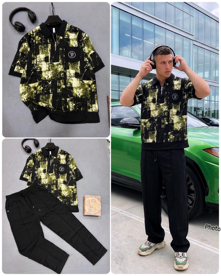 Yellow and black abstract print quarter-zip two-piece set with model wearing headphones.