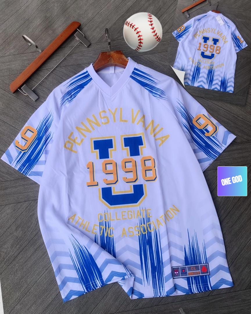 White blue and yellow Pennsylvania 1998 athletic jersey laid flat with baseball and back view.