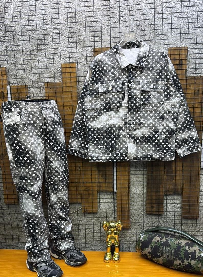 Black and white monogram print denim jacket and pants two-piece set.