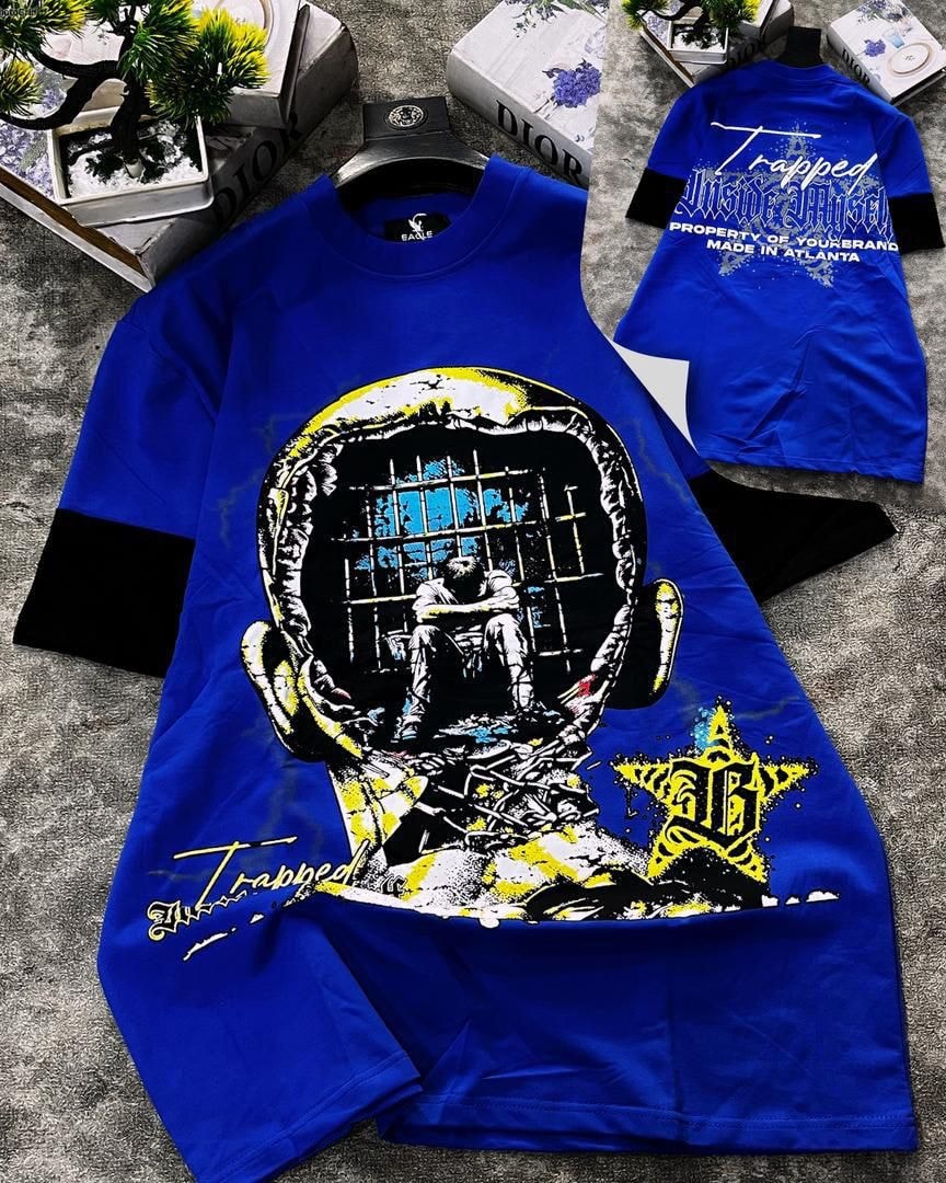 Blue round neck t-shirt with trapped head prison graphic and back print.