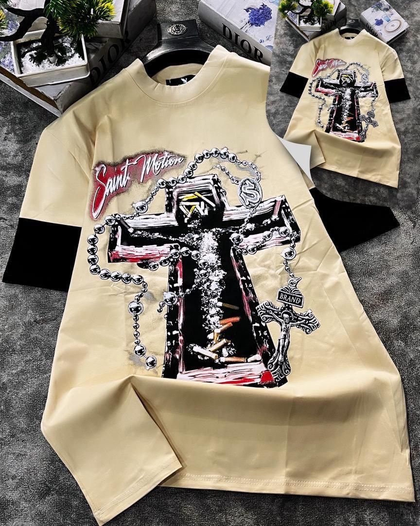 Cream round neck t-shirt with large cross and chain graphic print.