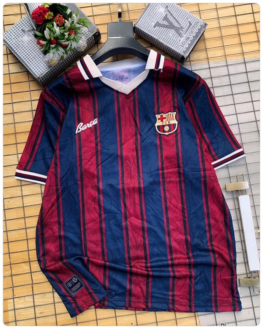 Retro blue and red striped FC Barcelona jersey with V-neck and crest.