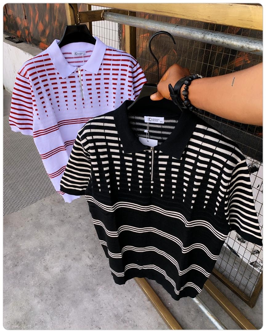 Red-white striped polo and black-white striped polo shirts on hangers.