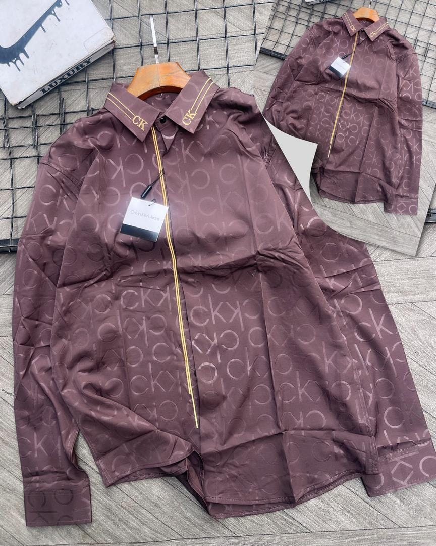 Maroon Calvin Klein monogram all-over print long sleeve shirt with CK collar.