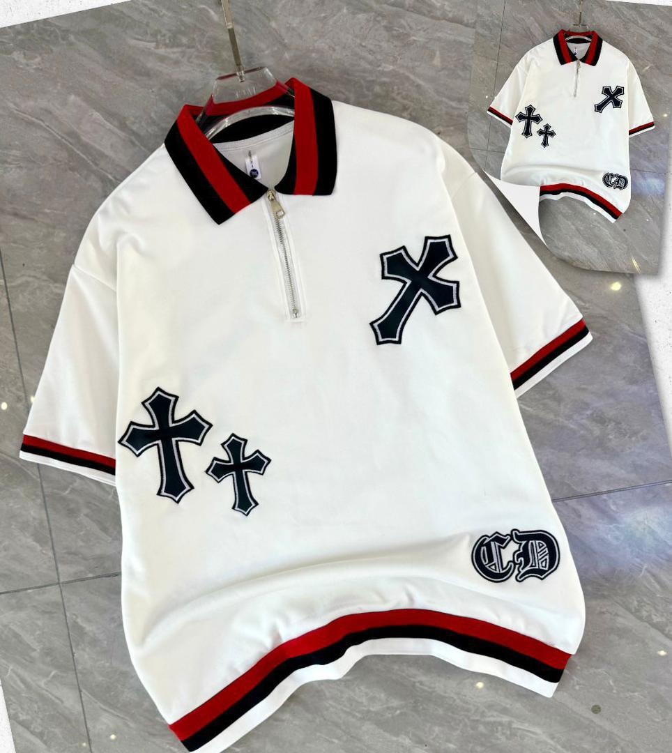 White quarter-zip polo shirt with black cross embroidery and striped trim.