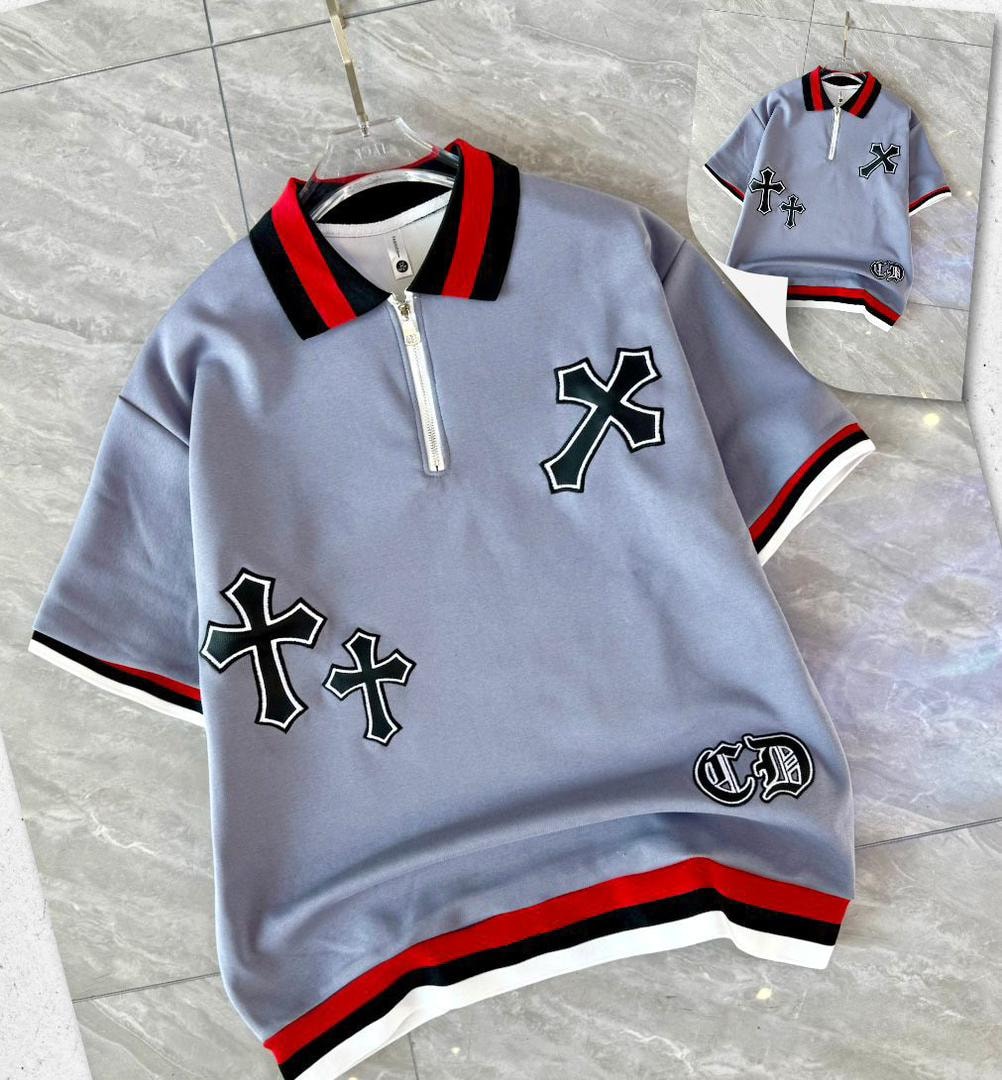 Gray quarter-zip polo shirt with cross embroidery and striped trim.