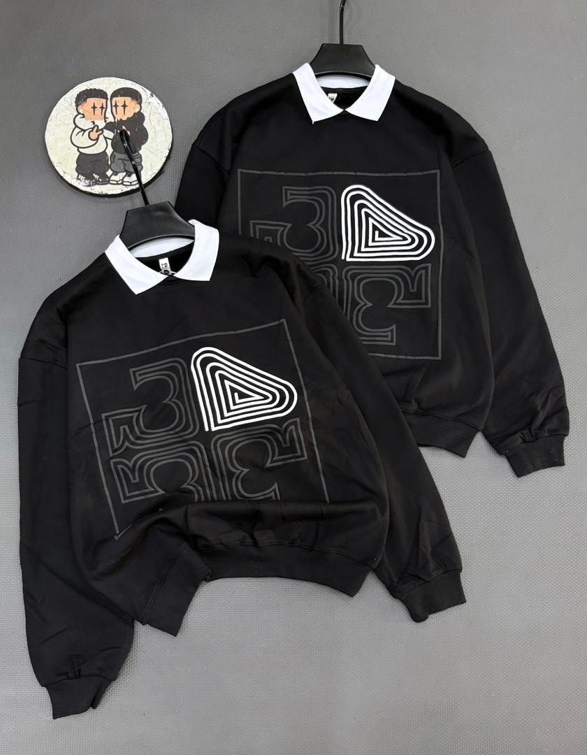 Black long sleeve sweatshirt with geometric graphic print and white contrast collar.