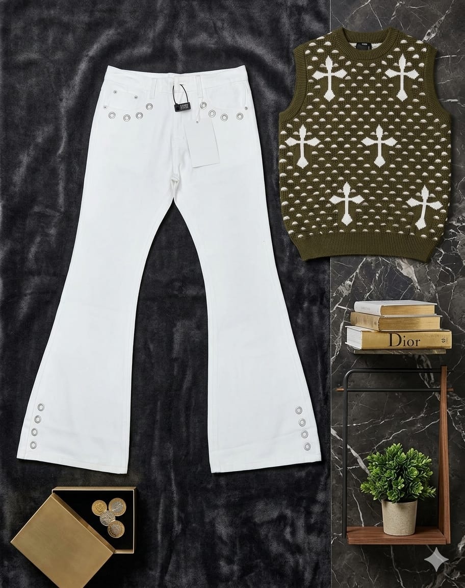 Olive cross pattern knit vest with white flared pants and eyelet details on dark surface.