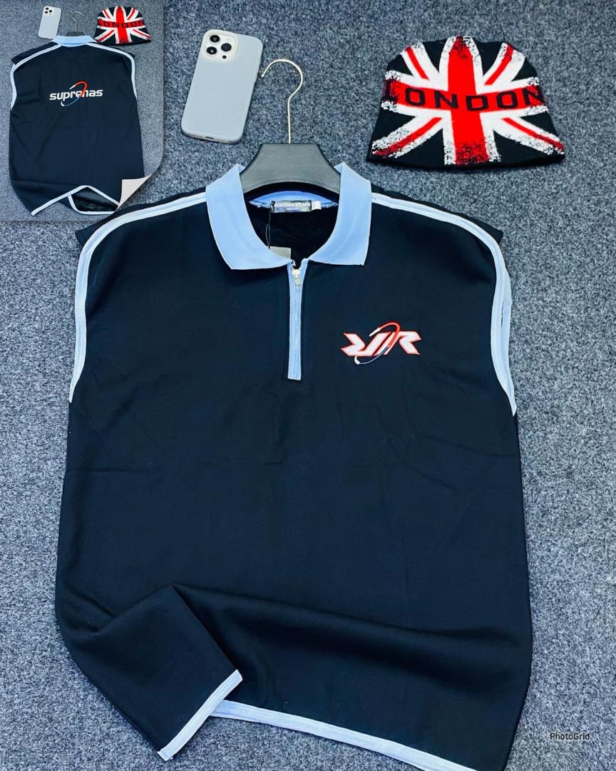 Black armless quarter-zip polo with XJR logo on chest.