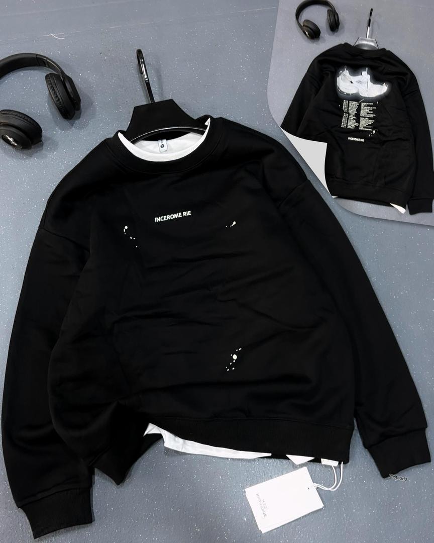 Black sweatshirt with INCEROME RIE text, splatter details and back cloud graphic.