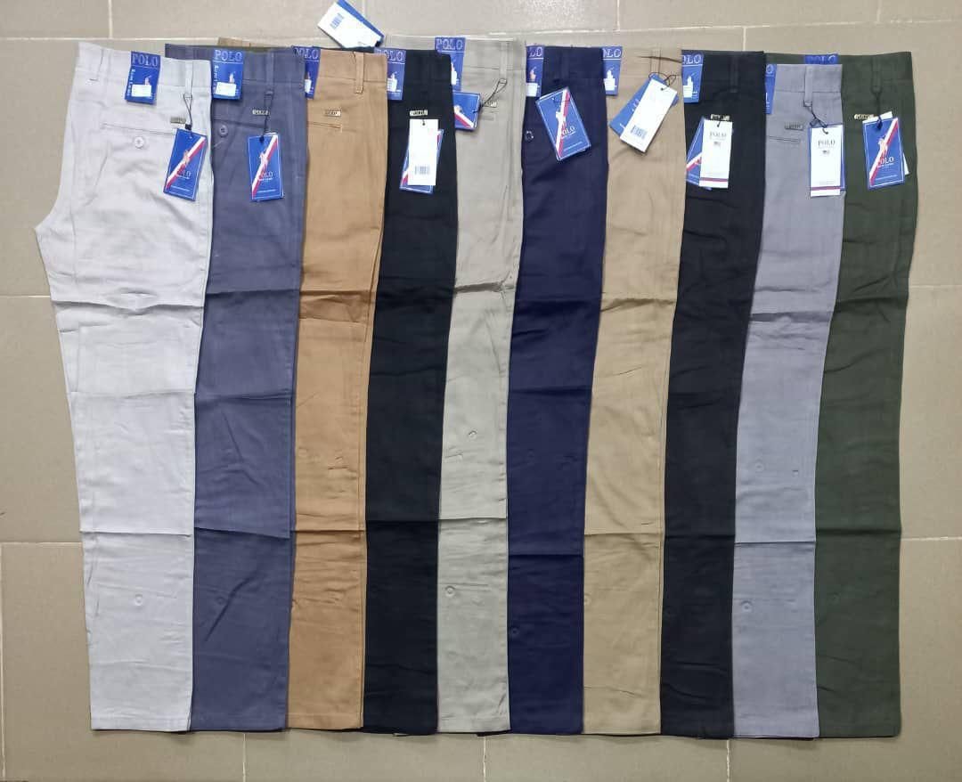 Polo chinos displayed in ten different colors including beige, black, navy, gray, khaki and olive.