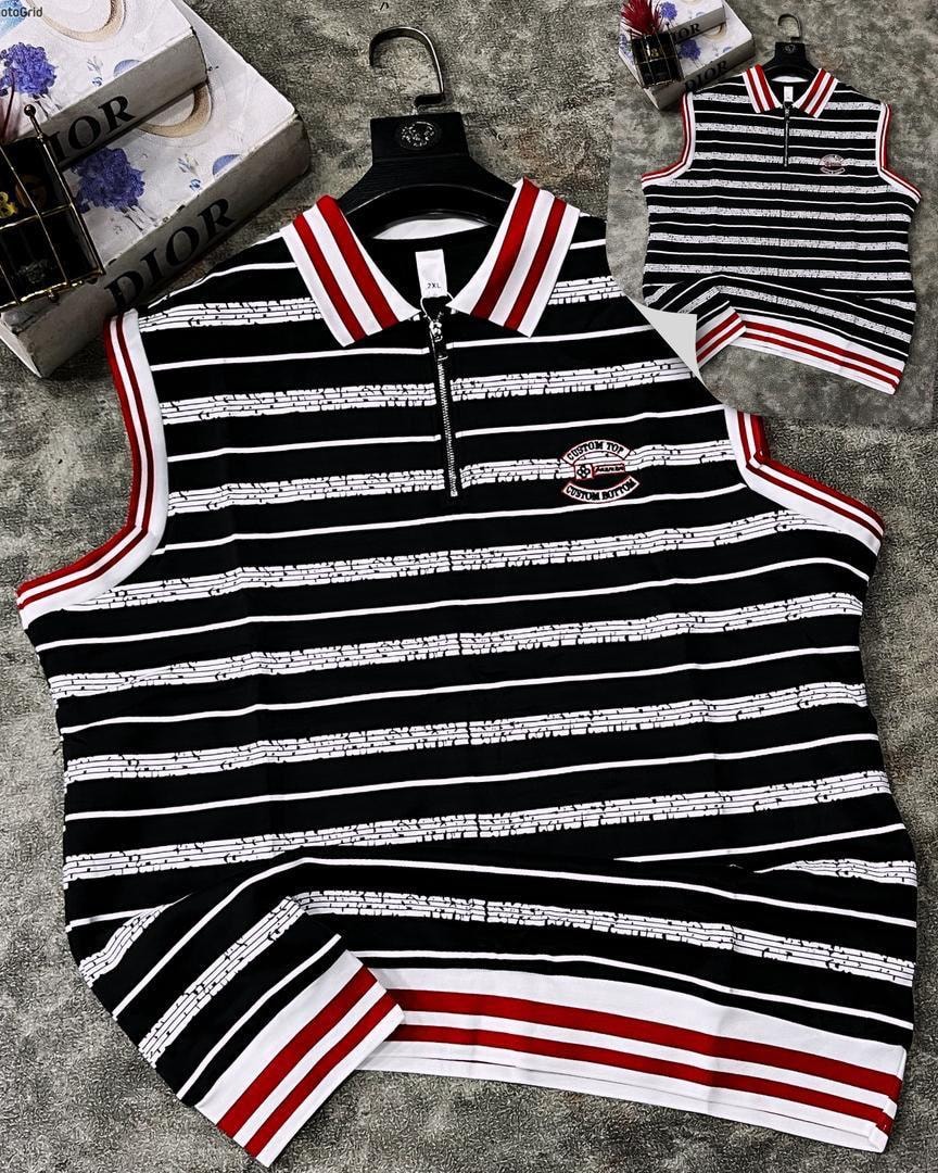 Black striped quarter-zip armless polo with red and white trim, flat lay view showing front and collar details.