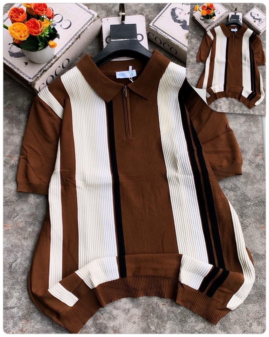 Brown vertically striped ribbed polo shirt with white and black accents.