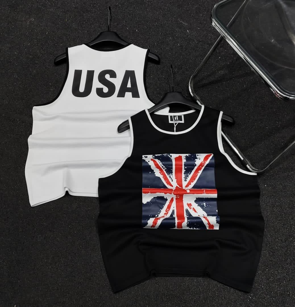 White armless polo with black USA text on back and black armless polo with Union Jack print on front.