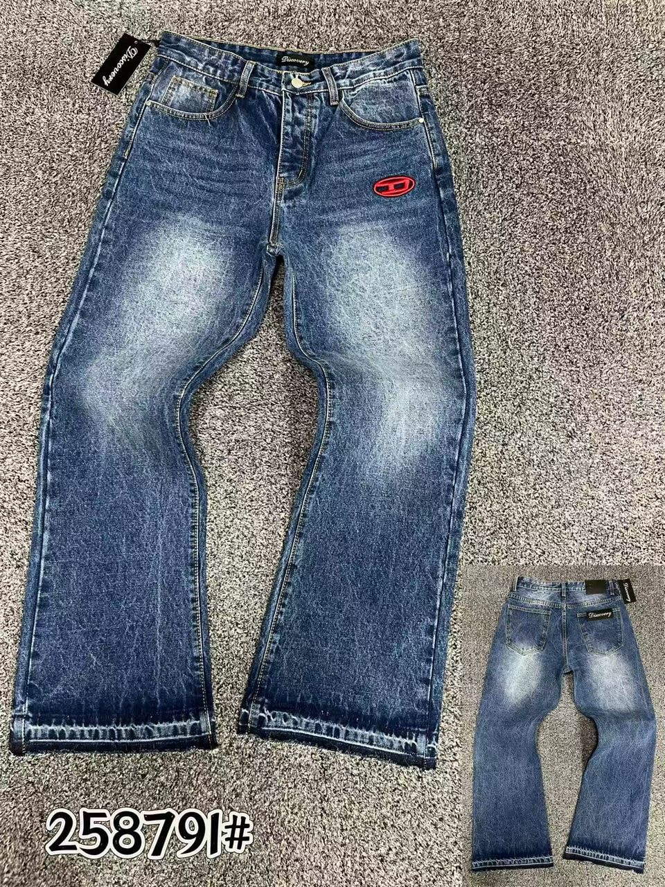 Blue faded Discovery baggy jeans shown flat with front logo and back view inset.