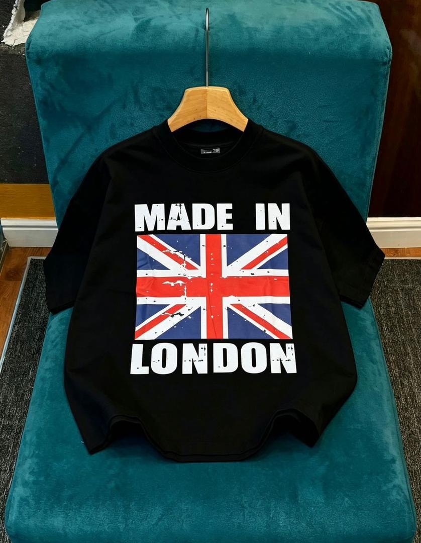 Black cropped tee on green chair featuring Made in London and Union Jack print.