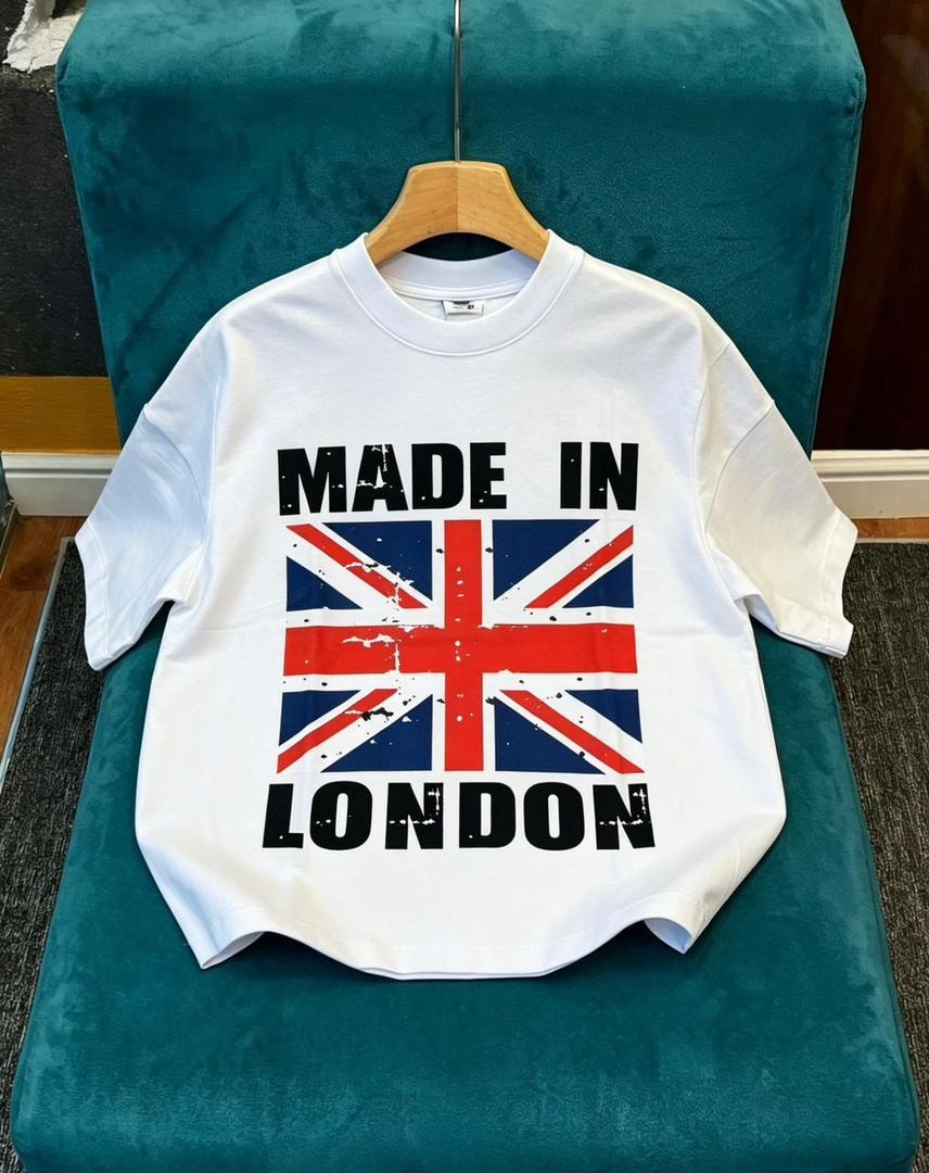 White cropped tee on green chair with Made in London Union Jack graphic.