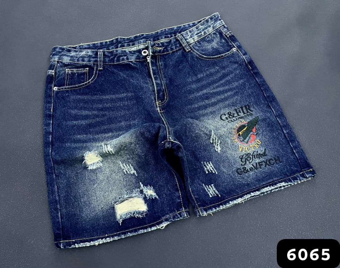 Blue denim shorts with G&FIR logo patch on leg and ripped details.