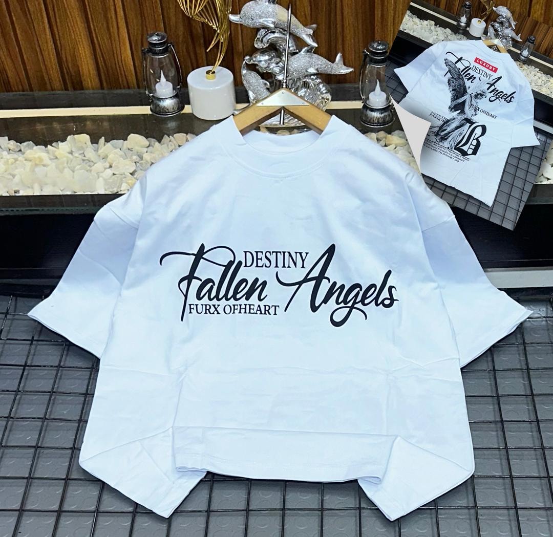 White oversized t-shirt with black Fallen Angels cursive text.