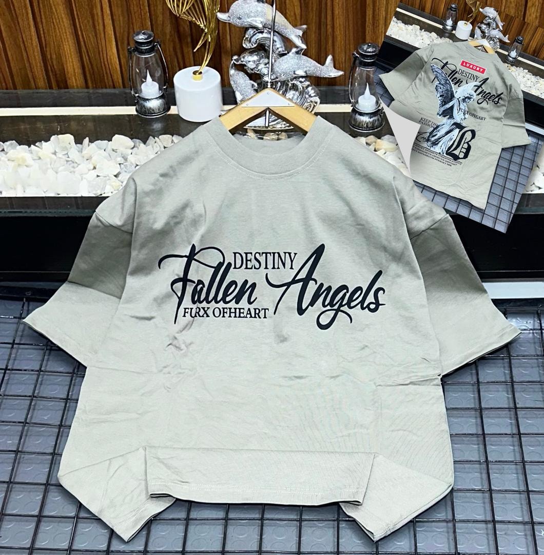 Beige oversized t-shirt with black Fallen Angels cursive text.