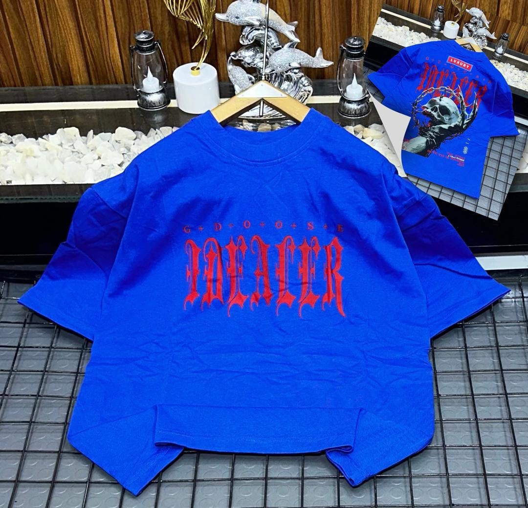 Blue oversized t-shirt with red IDEALER gothic text on front.