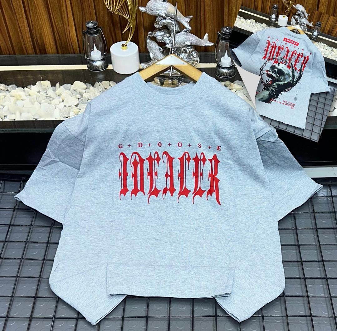 Light gray oversized t-shirt with red IDEALER gothic text on front.