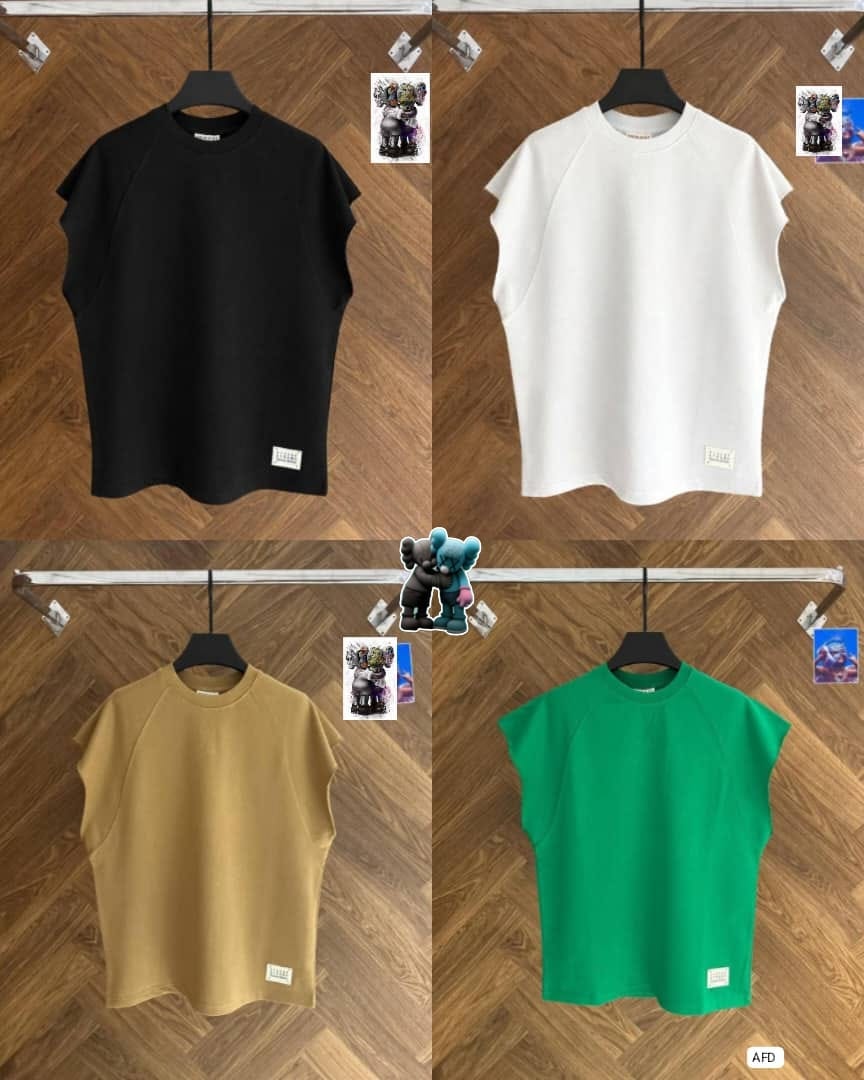 Sleeveless unisex tops in black, white, tan and green colors displayed on hangers.