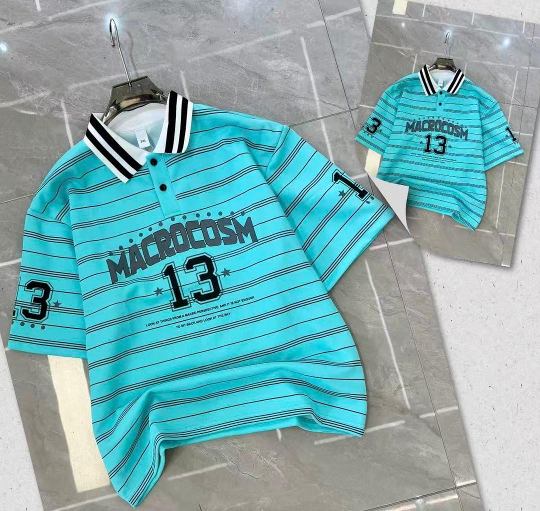 Light blue striped polo shirt with number graphics on chest and sleeves.