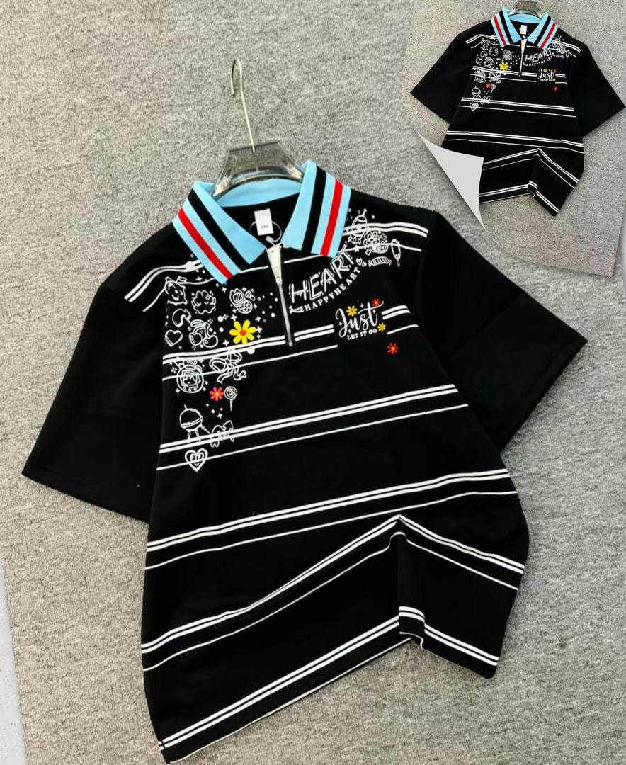 Black printed quarter-zip polo shirt with doodle graphics and striped collar.