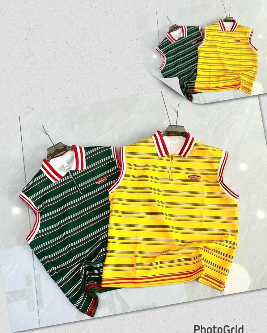 Green and yellow striped armless polos displayed on hangers with red and white trim.