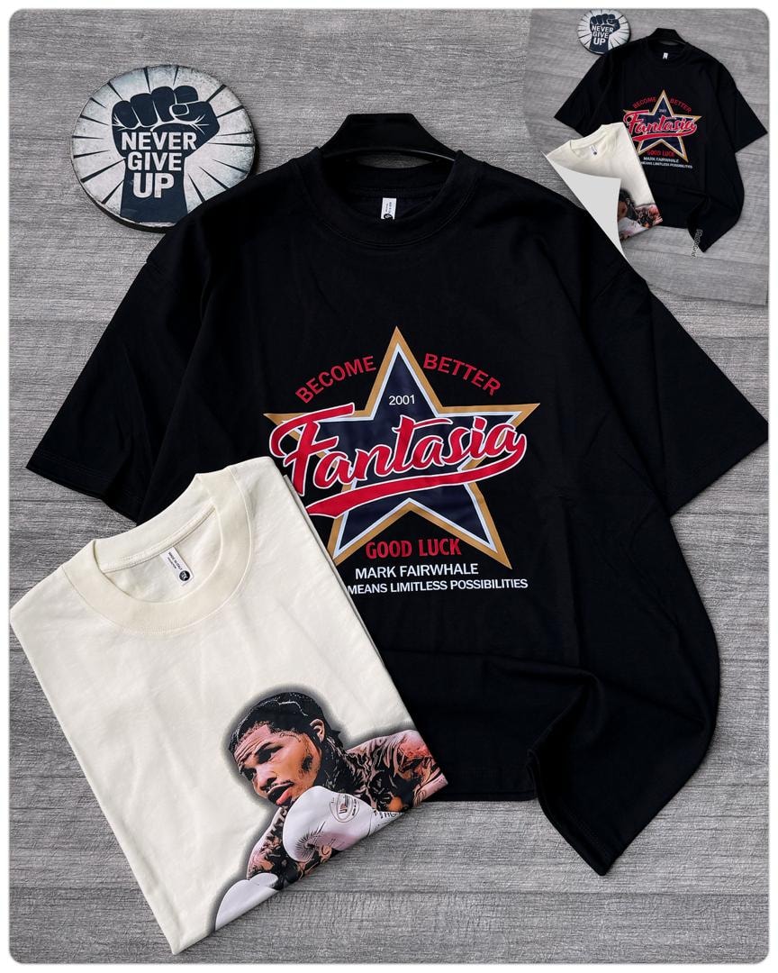 Black oversized t-shirt with Fantasia star graphic on hanger with folded cream portrait tee and inset showing color variants.