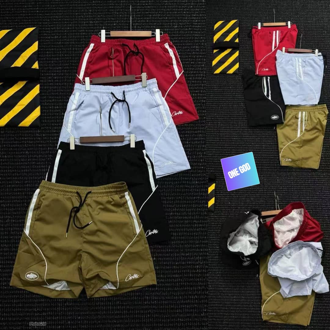 Assorted colors of cargo pocket contrast shorts with logos, piping and interior views.