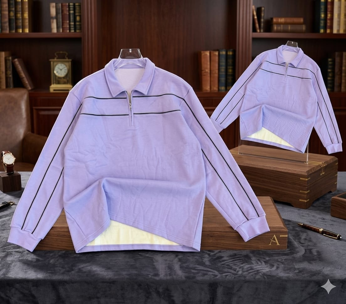 Light purple long sleeve quarter-zip polo with black stripes on chest and sleeves, shown with inner lining.
