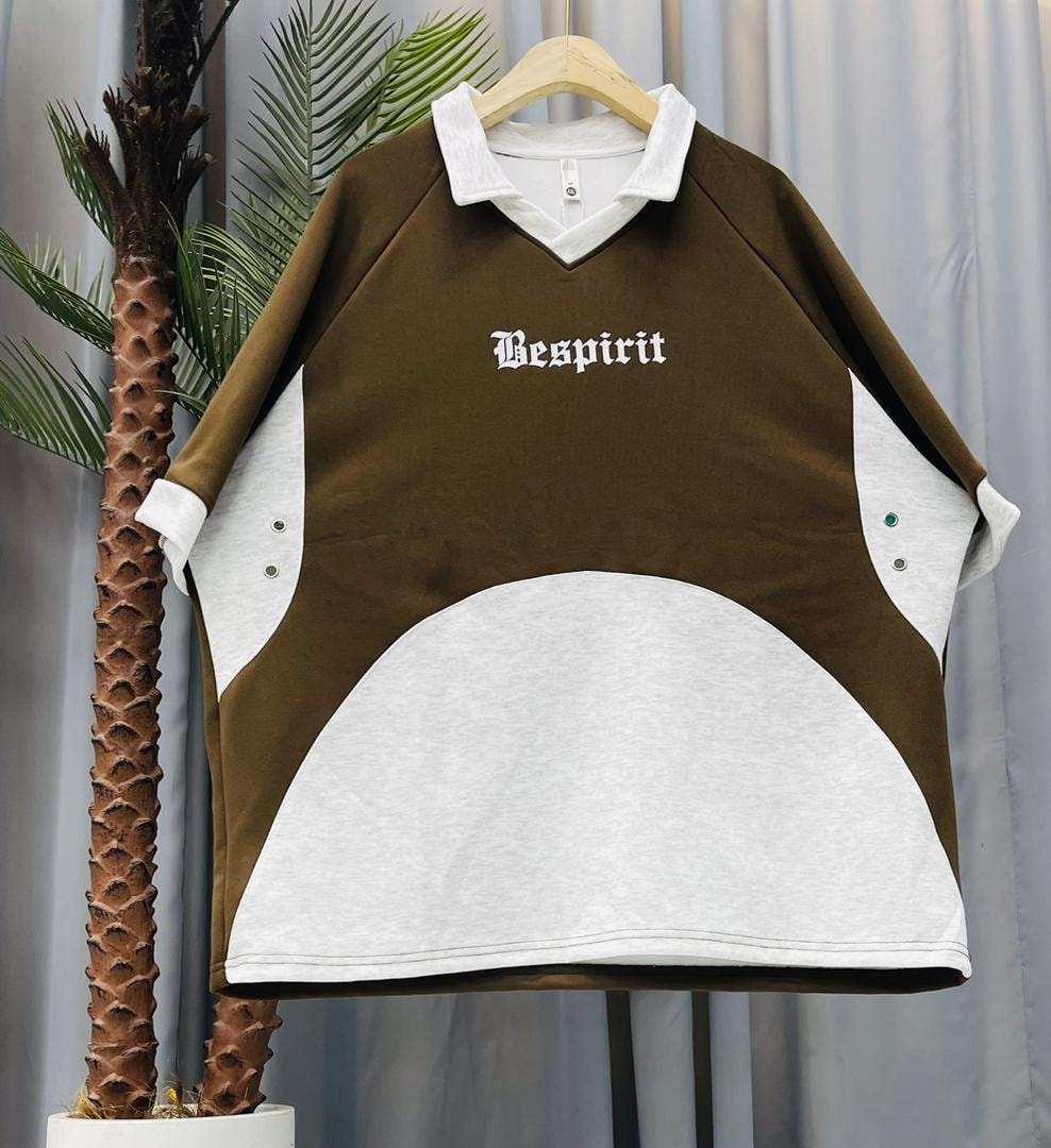 Brown unisex colorblock V-neck tee with white panels and Vesprit chest print.