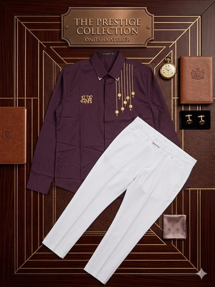 Purple shirt with gold embroidery and white trousers against dark wood with prestige signage and accessories.