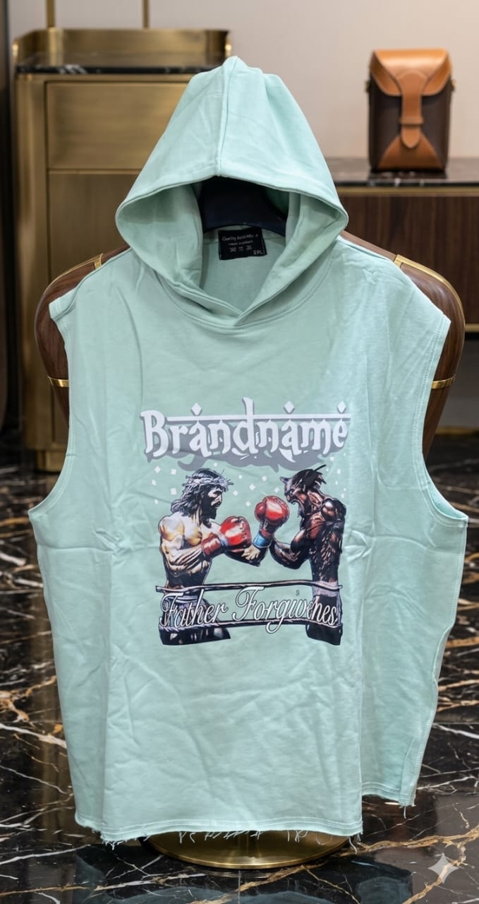 Mint green sleeveless hoodie with fighters graphic and text print on marble surface.